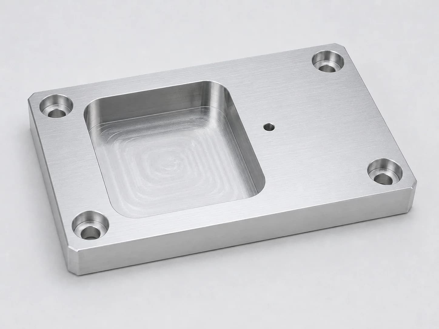 Illustrative CNC-milled aluminum fixture plate used to explain quote-review features